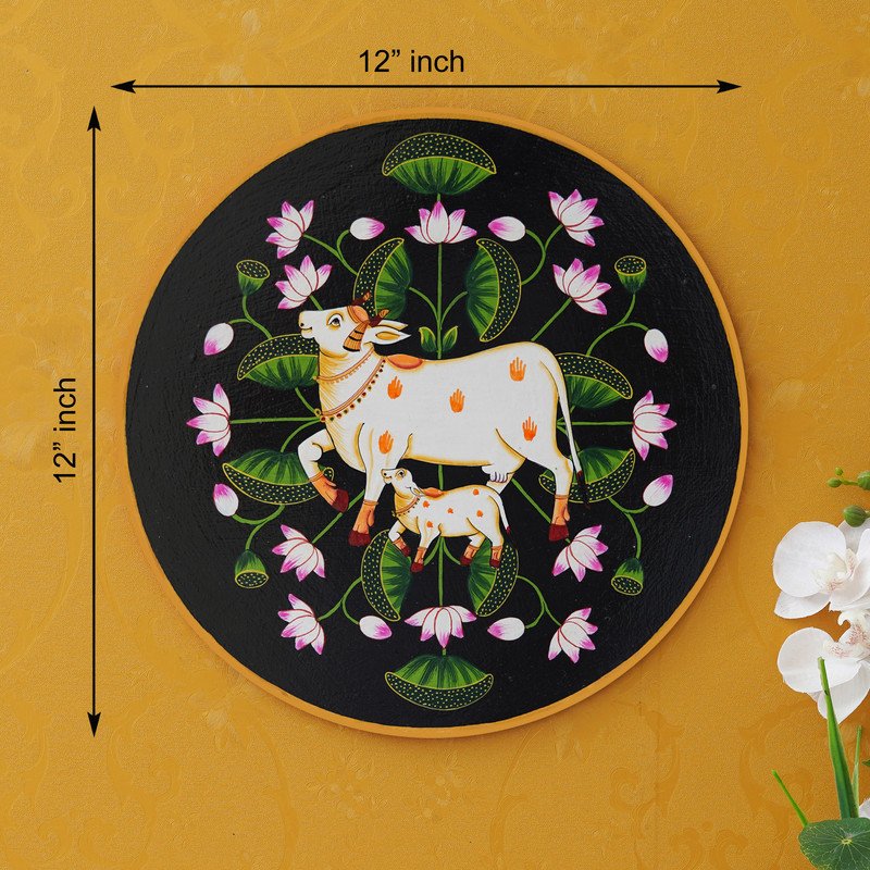 This beautiful pichwai painting features a mother cow and her calf nuzzling each other, surrounded by a vibrant array of flowers.