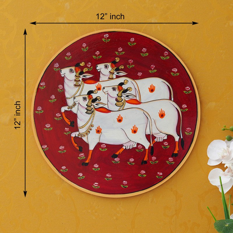 Crafted On A Red Plate This Pichwai Portrays Between A Playful Cow And A Delicate Lotus Flower