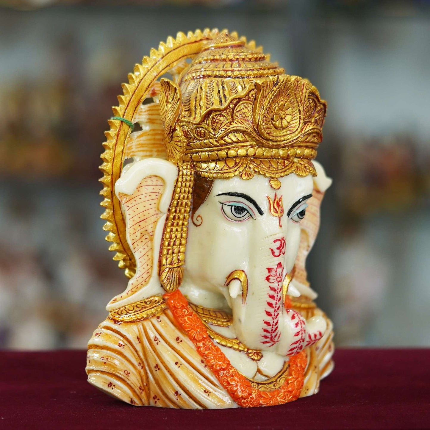 Marble Dust Ganesha Ji Face Statue Sitting on a Table