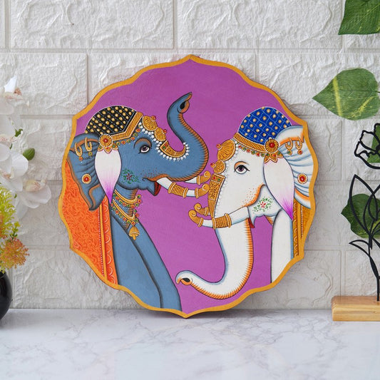 A Beautiful Pichwai Painting of two Elephants Standing Next to Each Other on a Purple Plate