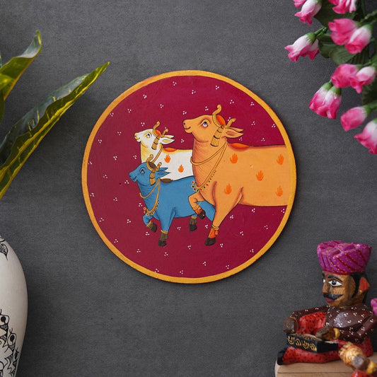 Crafted on a Wooden Plate This Pichwai Portrays Three Cows in a Circular Formation
