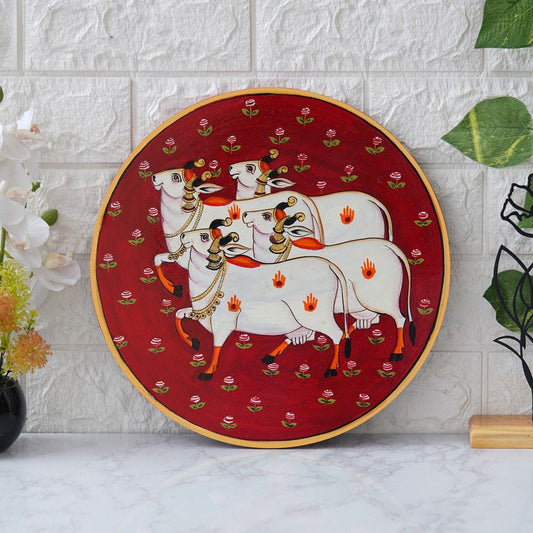 Crafted On A Red Plate This Pichwai Portrays Between A Playful Cow And A Delicate Lotus Flower