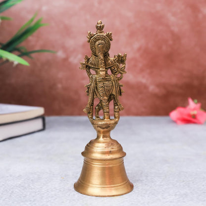 The Advitya Brass Krishan with Flute Standing on Bell