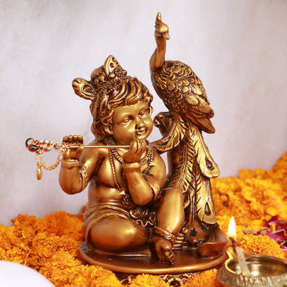 Artarium Seated Baby Krishna with Peacock Idol